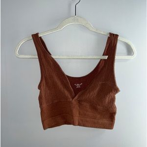 Brown Urban Outfitters crop top.